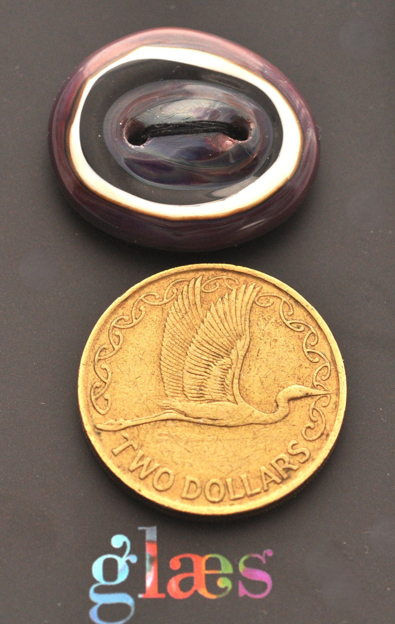 Striking Glass Button
